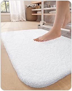 salle de bain accessoires robinet baignoire lavabo vasque tapis douchette poubelle