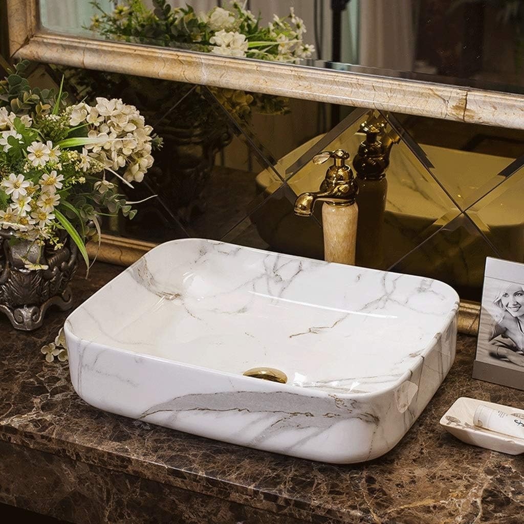 salle de bain accessoires robinet baignoire lavabo vasque tapis douchette poubelle