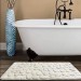 salle de bain accessoires robinet baignoire lavabo vasque tapis douchette poubelle